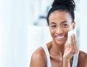 Woman using at home skincare essentials